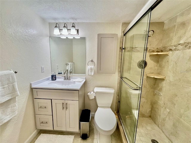 845 Benjamin Franklin Dr Unit 104, Sarasota, FL 34236 - bathroom with a stall shower, a textured ceiling, vanity, toilet, and a textured wall