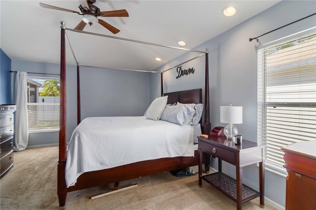 carpeted bedroom with baseboards and recessed lighting
