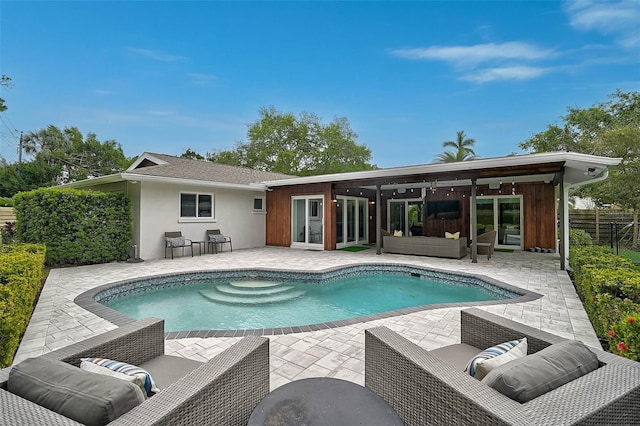 577 Corwood Dr, Sarasota, FL 34234 - pool featuring an outdoor hangout area, fence, and a patio area