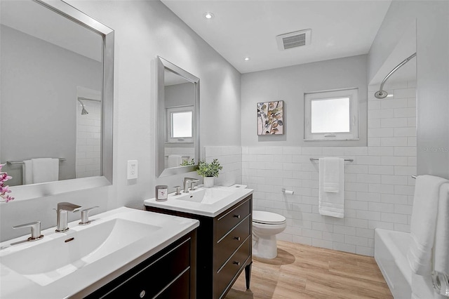 577 Corwood Dr, Sarasota, FL 34234 - bathroom with plenty of natural light, visible vents, and a sink