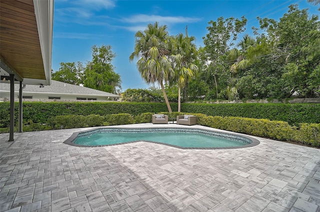 577 Corwood Dr, Sarasota, FL 34234 - view of swimming pool featuring a fenced in pool, outdoor lounge area, and a patio area
