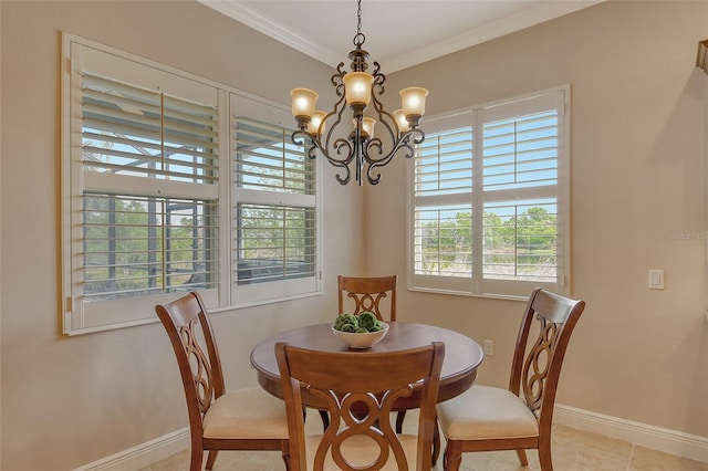 dining space featuring light tile patterned floors, a notable chandelier, crown molding, and baseboards