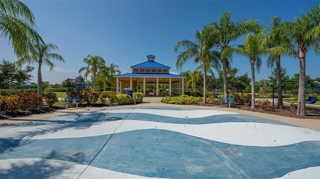 view of swimming pool featuring a gazebo