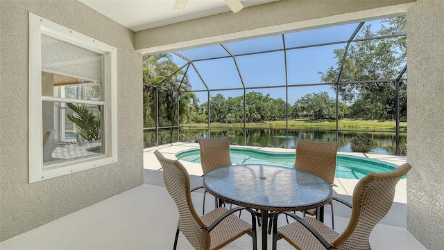 12041 Thornhill Ct, Lakewood Ranch, FL 34202 - view of patio featuring a lanai, an outdoor pool, and a water view
