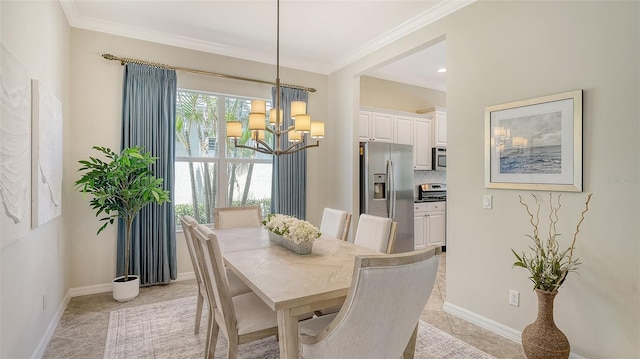 12041 Thornhill Ct, Lakewood Ranch, FL 34202 - dining room featuring crown molding, light tile patterned floors, a notable chandelier, and baseboards