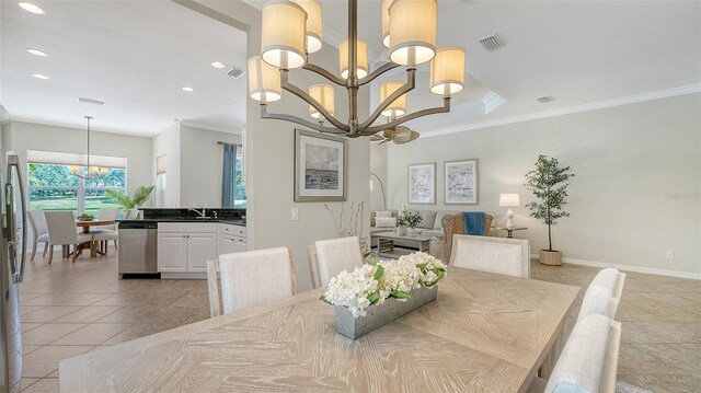 12041 Thornhill Ct, Lakewood Ranch, FL 34202 - dining space featuring recessed lighting, visible vents, an inviting chandelier, and ornamental molding