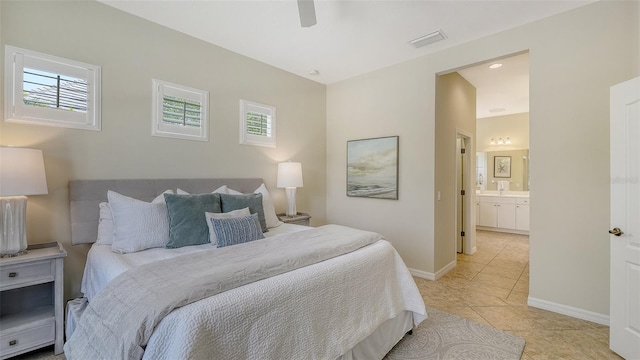 12041 Thornhill Ct, Lakewood Ranch, FL 34202 - bedroom featuring light tile patterned flooring, baseboards, multiple windows, and visible vents