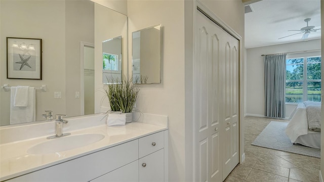 12041 Thornhill Ct, Lakewood Ranch, FL 34202 - ensuite bathroom with ceiling fan, baseboards, ensuite bathroom, and vanity