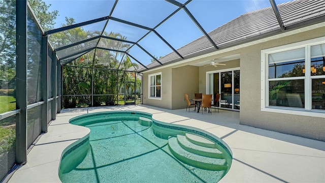 12041 Thornhill Ct, Lakewood Ranch, FL 34202 - outdoor pool featuring a lanai, a patio area, and a ceiling fan