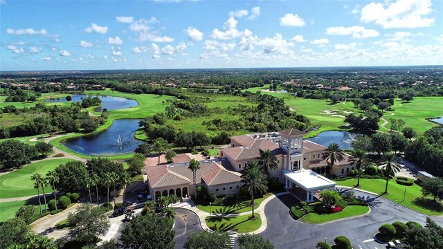 12041 Thornhill Ct, Lakewood Ranch, FL 34202 - aerial view with golf course view, a residential view, and a water view