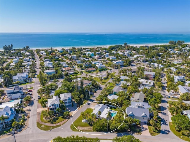 bird's eye view with a residential view and a water view