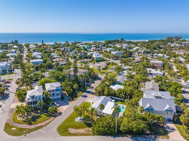 aerial view featuring a residential view and a water view