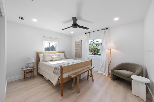 bedroom featuring recessed lighting, light wood-style flooring, and visible vents