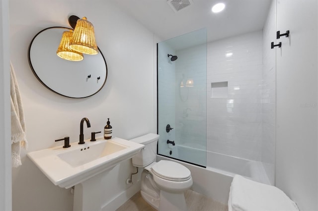 full bathroom with visible vents, toilet, recessed lighting, shower / bath combination, and a sink