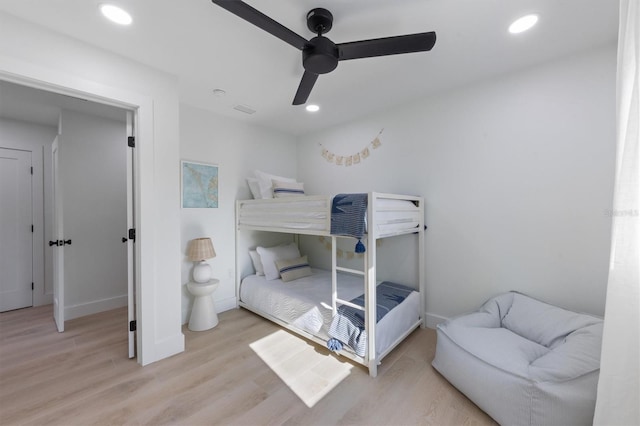 bedroom featuring visible vents, wood finished floors, baseboards, recessed lighting, and a ceiling fan
