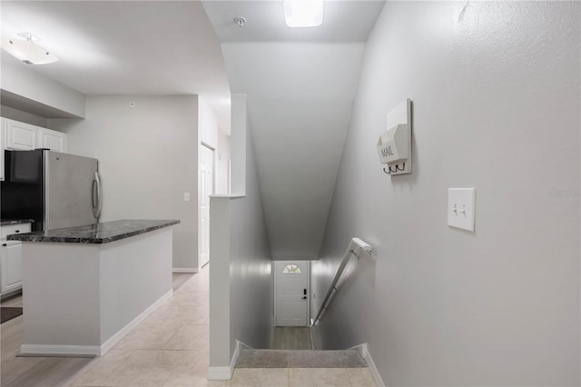 staircase with baseboards