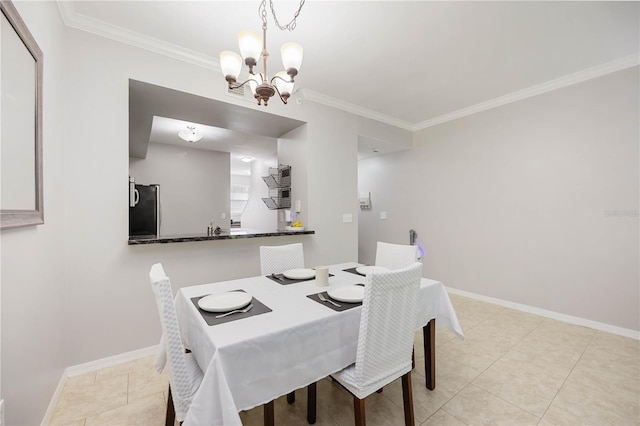 dining room with a chandelier, light tile patterned flooring, crown molding, and baseboards