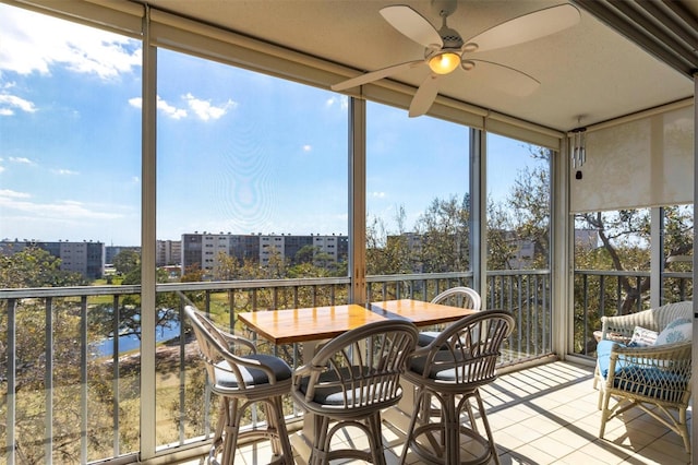 3620 Ironwood Cir Unit 606, Bradenton, FL 34209 - sunroom / solarium with a wall of windows, a view of city, and tile patterned floors