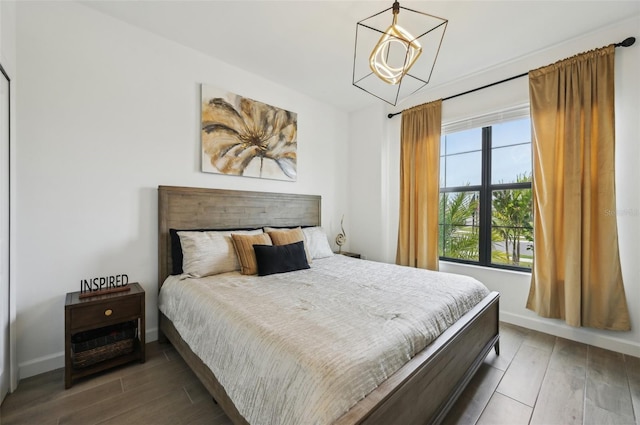 15104 Blue Bay Ter, Lakewood Ranch, FL 34211 - bedroom with wood finished floors and baseboards