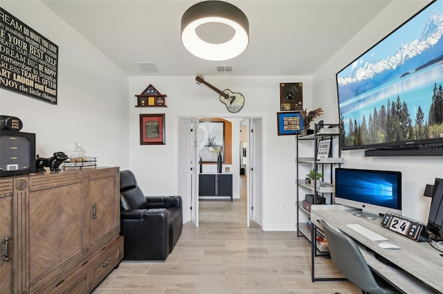 15104 Blue Bay Ter, Lakewood Ranch, FL 34211 - home office featuring light wood-style flooring and baseboards