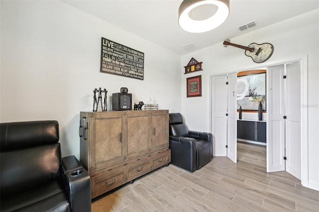 15104 Blue Bay Ter, Lakewood Ranch, FL 34211 - sitting room featuring light wood-style floors