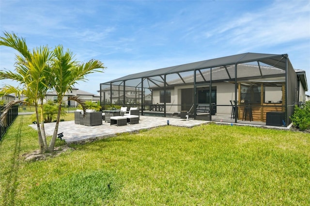 15104 Blue Bay Ter, Lakewood Ranch, FL 34211 - rear view of house with an outdoor living space, a patio area, and a lanai