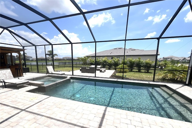 15104 Blue Bay Ter, Lakewood Ranch, FL 34211 - view of swimming pool with a patio, a pool with connected hot tub, and glass enclosure
