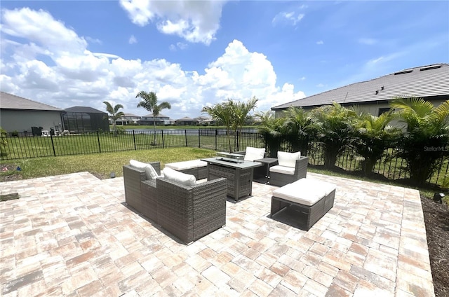 15104 Blue Bay Ter, Lakewood Ranch, FL 34211 - view of patio / terrace with an outdoor living space with a fire pit and a residential view