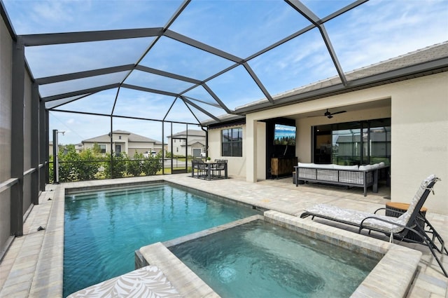 15104 Blue Bay Ter, Lakewood Ranch, FL 34211 - view of pool with a patio, a pool with connected hot tub, ceiling fan, and glass enclosure