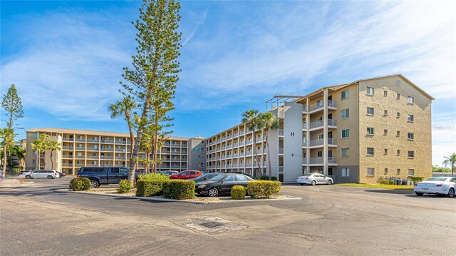 3763 Lake Bayshore Dr Unit 310, Bradenton, FL 34205 - view of property featuring uncovered parking
