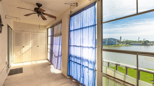 3763 Lake Bayshore Dr Unit 310, Bradenton, FL 34205 - unfurnished sunroom with a water view