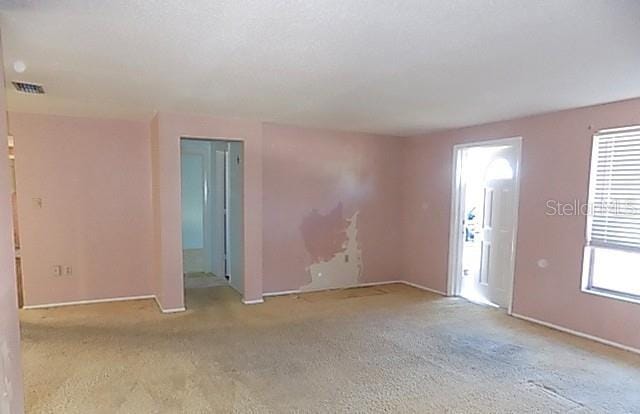 6309 35th Ave W, Bradenton, FL 34209 - unfurnished room featuring carpet flooring and visible vents
