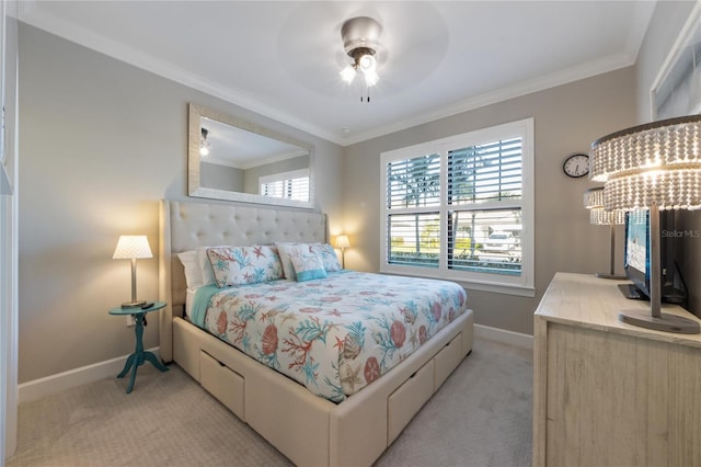 bedroom with baseboards, a ceiling fan, crown molding, and light colored carpet