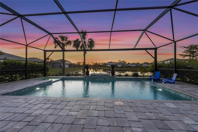 pool featuring a lanai and a patio