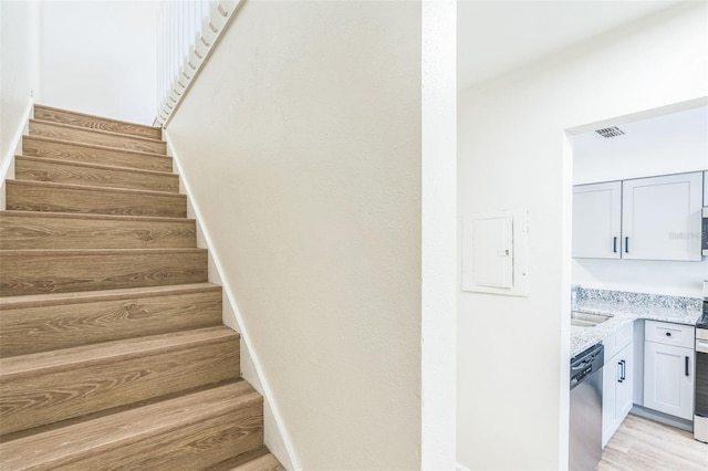 1236 Dovehill Dr, Apopka, FL 32703 - staircase with wood finished floors