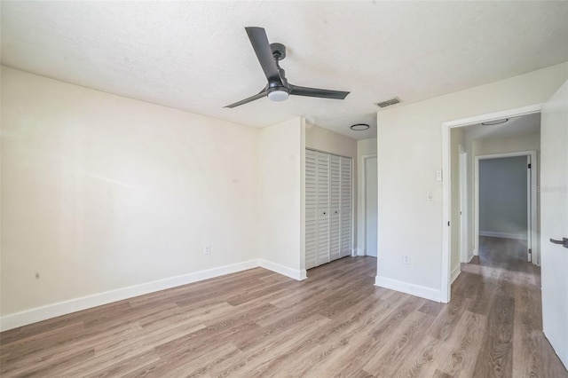 1236 Dovehill Dr, Apopka, FL 32703 - unfurnished bedroom featuring light wood-type flooring, a closet, and ceiling fan