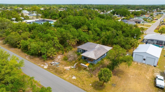 3320 Audette St, Port Charlotte, FL 33948 - drone / aerial view with a residential view and a view of trees