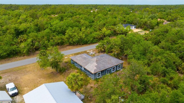 3320 Audette St, Port Charlotte, FL 33948 - birds eye view of property featuring a forest view