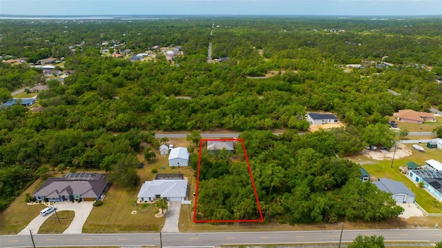 3320 Audette St, Port Charlotte, FL 33948 - bird's eye view with a residential view and a view of trees