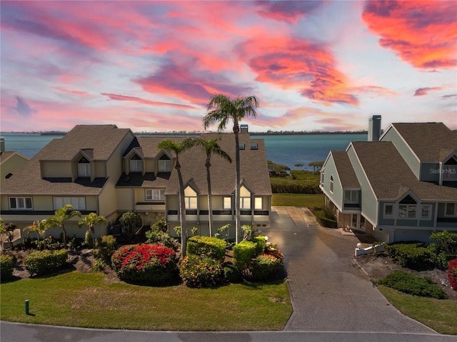 71 Tidy Island Blvd, Bradenton, FL 34210 - exterior space featuring driveway and a water view