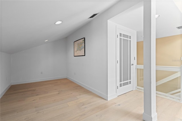 71 Tidy Island Blvd, Bradenton, FL 34210 - additional living space with lofted ceiling, recessed lighting, baseboards, light wood finished floors, and visible vents