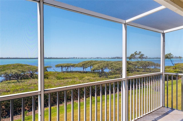 71 Tidy Island Blvd, Bradenton, FL 34210 - unfurnished sunroom featuring a water view