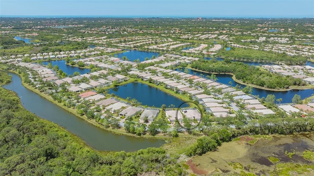 bird's eye view with a water view and a residential view