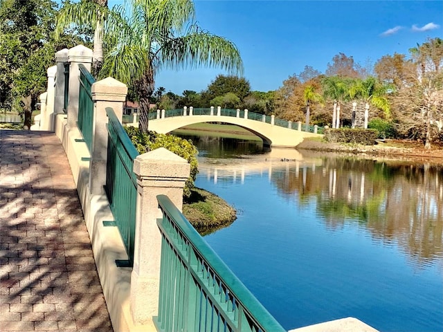 view of pool with a water view