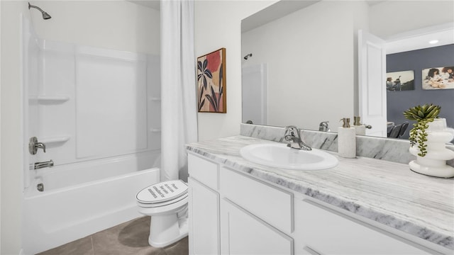 2481 Mellow Ln, Clearwater, FL 33765 - full bathroom with toilet, vanity, shower / tub combination, and tile patterned floors