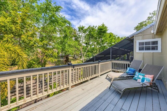 wooden terrace with a lanai