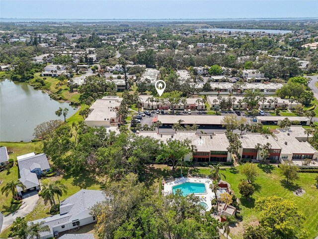 aerial view featuring a residential view and a water view