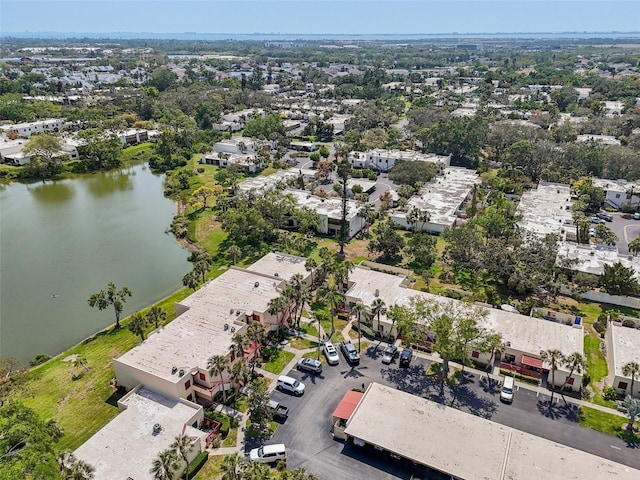 bird's eye view with a water view