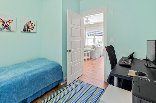 bedroom featuring wood finished floors
