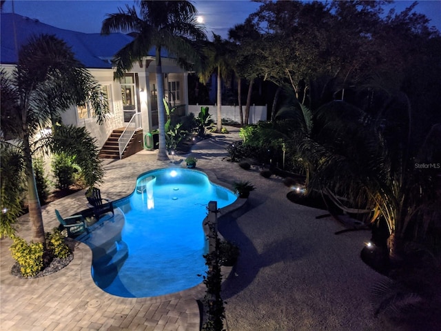 view of pool featuring a fenced in pool and a patio